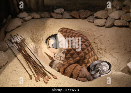 Beaker culture. Recreation of a Beaker grave of a young male at Fuente Olmedo (Valladolid). Burial with grave goods. Stock Photo