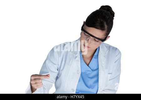 Female scientist conducting an experiment Stock Photo