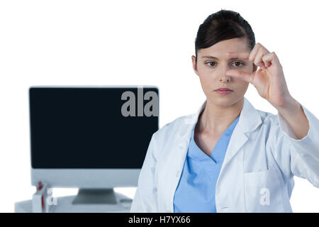 Female scientist conducting an experiment Stock Photo