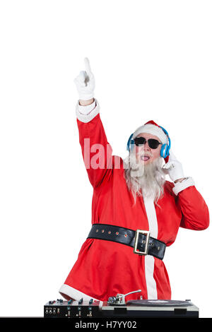 Santa claus playing a dj Stock Photo