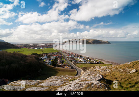 View W from lower terraces of the Little Orme to the Great Orme limestone headland, Llandudno town, seafront & pier, North Wales. Stock Photo