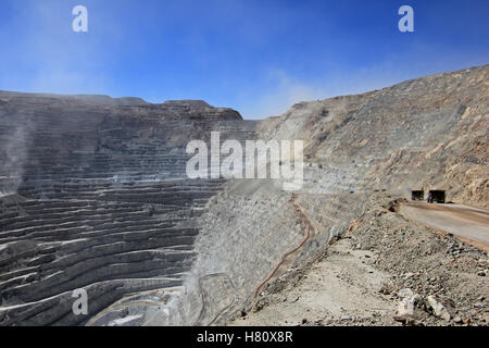 Chuquicamata, the world's biggest open pit copper mine with its trucks working, near Calama, Chile Stock Photo