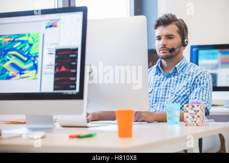 startup business, software developer working on desktop computer Stock Photo