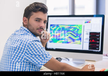 startup business, software developer working on desktop computer Stock Photo