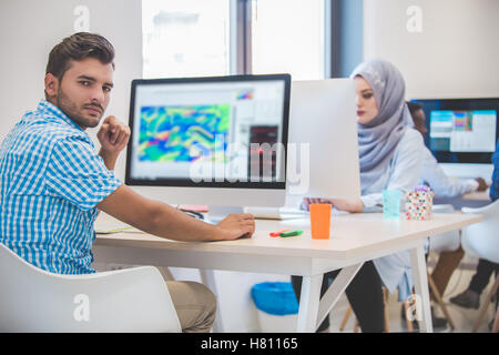 startup business, software developer working on desktop computer Stock Photo