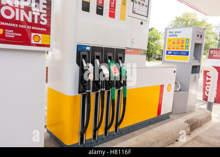 Petrol pump with the various fuel types at the Shell petrol station in Ickenham, Hillingdon, Greater London, UK Stock Photo