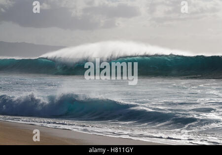A big Breaking barrel wave at famous Banzai Pipeline surf break on the north shore of Oahu Hawaii Stock Photo