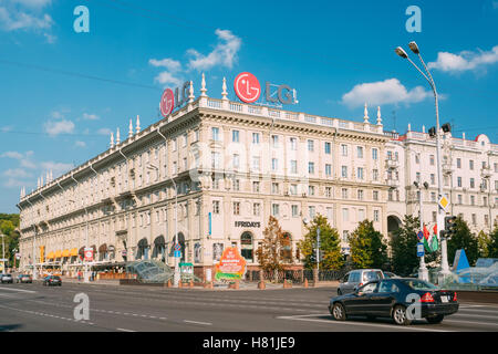 Minsk, Belarus. The Corner Of Huge Monumental Building Of Stalinist Empire Style Or Socialist Classicism With LG Signboard On To Stock Photo