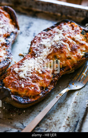 Rice and vegetables stuffed butternut squash in a pan. Stock Photo