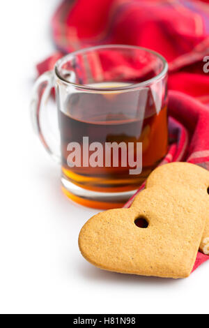 Gingerbread hearts and cup of tea with napkin isolated on white background. Stock Photo