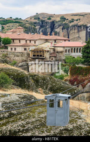 A monastery and a typical cable car in Meteora, Greece Stock Photo