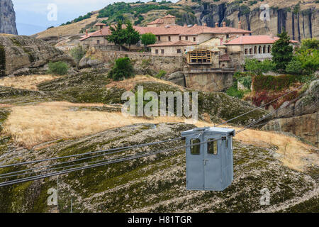 A monastery and a typical cable car in Meteora, Greece Stock Photo