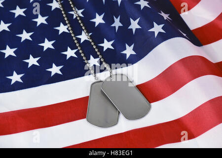 military dog tags on American flag Stock Photo