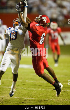 Sep. 18, 2009; Fresno, CA, USA;  Fresno State Bulldogs wide receiver Chastin West (6) makes a reception over Boise State Broncos cornerback Brandyn Thompson (13) during the third quarter at Bulldog Stadium. Boise State defeated Fresno State 51-34. Stock Photo