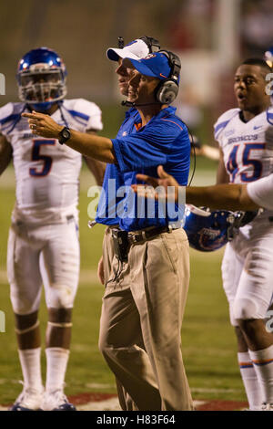 Boise State football coach Chris Petersen poses with the Paul Bear ...