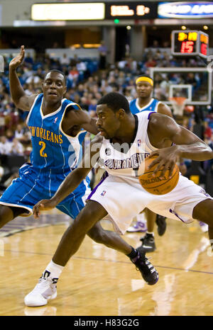 November 29, 2009; Sacramento, CA, USA;  Sacramento Kings guard Tyreke Evans (13) is guarded by New Orleans Hornets guard Darren Collison (2) during the third quarter at the ARCO Arena.  Sacramento defeated New Orleans 112-96. Stock Photo