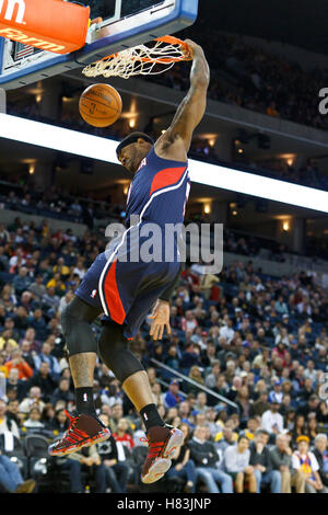 February 25, 2011; Oakland, CA, USA;  Atlanta Hawks power forward Josh Smith (5) dunks against the Golden State Warriors during the first quarter at Oracle Arena. Stock Photo