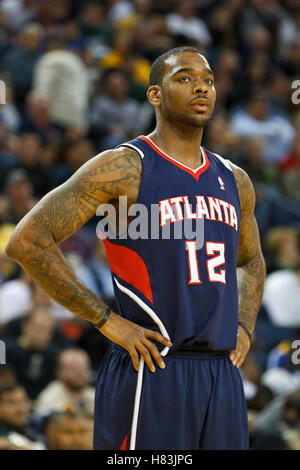 February 25, 2011; Oakland, CA, USA;  Atlanta Hawks center Josh Powell (12) before a free throw against the Golden State Warriors during the second quarter at Oracle Arena. Atlanta defeated Golden State 95-79. Stock Photo