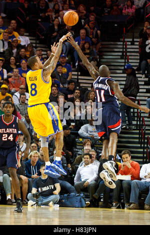 February 25, 2011; Oakland, CA, USA;  Golden State Warriors shooting guard Monta Ellis (8) shoots over Atlanta Hawks guard Jamal Crawford (11) during the second quarter at Oracle Arena. Stock Photo