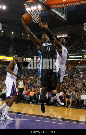 Jan 8, 2012; Sacramento, CA, USA; Orlando Magic power forward Glen Davis (11) shoots against the Sacramento Kings during the second quarter at Power Balance Pavilion. Stock Photo