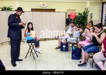 Miami Florida,Hialeah,JFK Library,Health and Literacy Fair,interior inside,Black Blacks African Africans ethnic minority,adult adults man men male,mag Stock Photo