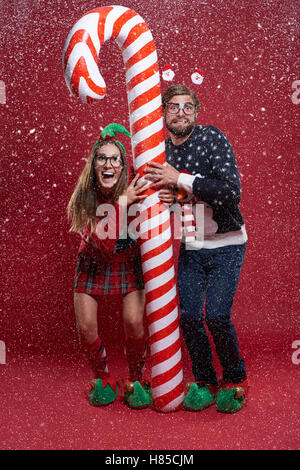 Standing with candy cane during the sandstorm Stock Photo