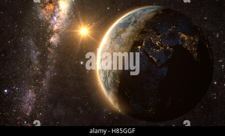 orange Sunset over earth as seen from space. With stars background. Stock Photo