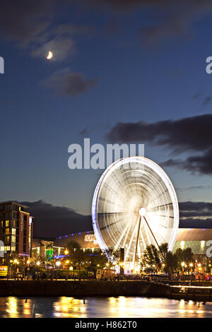 Big wheel at the Albert Dock Liverpool lit up at night Stock Photo