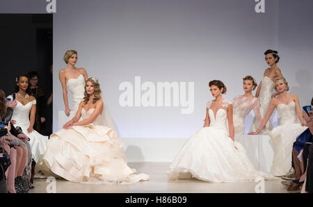 NEW YORK, NY - October 06, 2016: Models pose during the Anne Barge Bridal Fall/Winter 2017 Runway Show Stock Photo