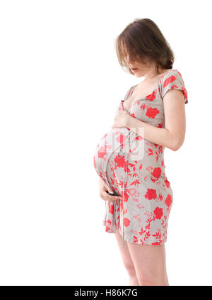 Pregnant woman holding her belly Stock Photo