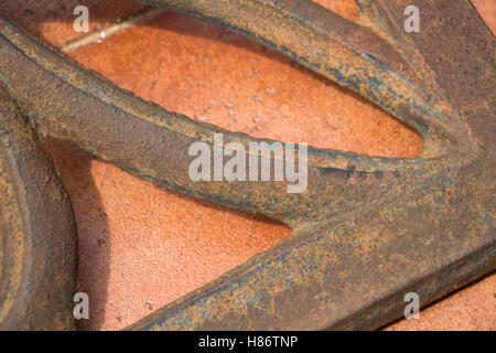 Heavy metal umbrella stand in close-up creating abstract shapes and textures Stock Photo