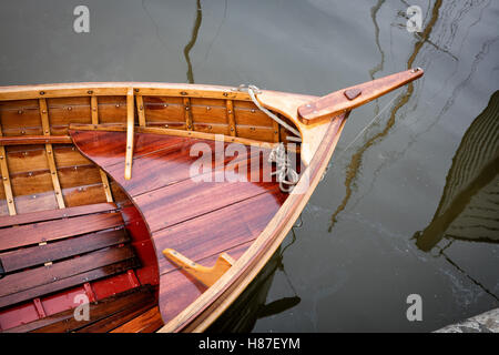 Varnished prow of a small wooden boat in Bristol harbour UK Stock Photo