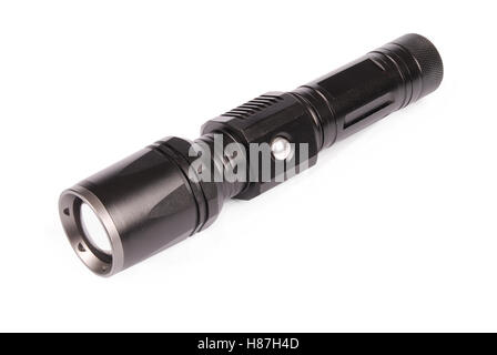 Black LED tactical flashlight isolated on white background with soft shadow. Clipping path Stock Photo