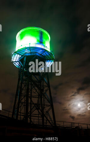 Germany, Ruhr area, Bochum, the Westpark at the Century Hall, illuminated water tower. Stock Photo