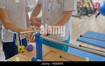 Hand therapy with physiotherapist Equipments Stock Photo