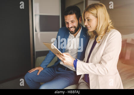 Business people on business trip staying in hotel Stock Photo