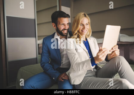 Business colleagues taking selfie on business trip Stock Photo