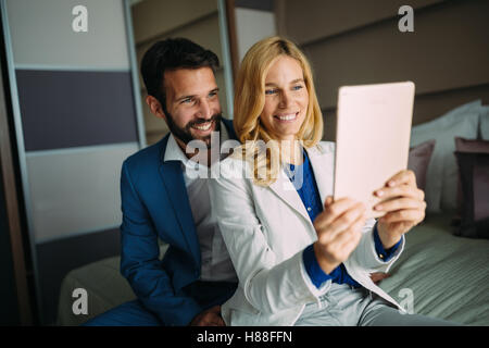 Business colleagues taking selfie on business trip Stock Photo