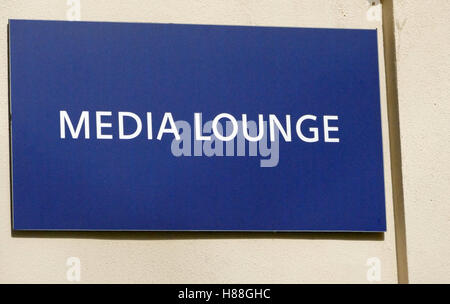 Media lounge sign on a sunny wall Stock Photo