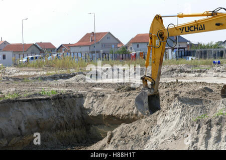 Belgrade, Serbia. September 9th, 2016: Construction Site with construction machinery, bulldozer and workers for bulding home apa Stock Photo