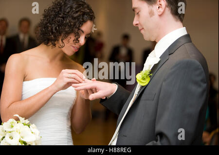 Civil ceremony, putting on the ring Stock Photo