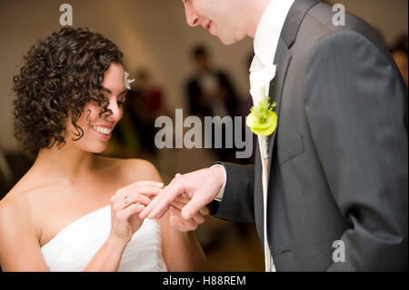 Civil ceremony, putting on the ring Stock Photo