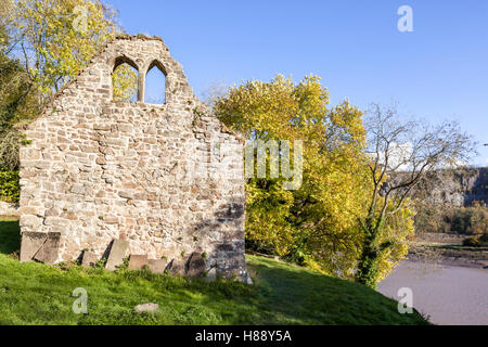 Autumn in the Wye Valley - The ruins of 12th century St James church beside the River Wye at Lancaut, Gloucestershire UK Stock Photo