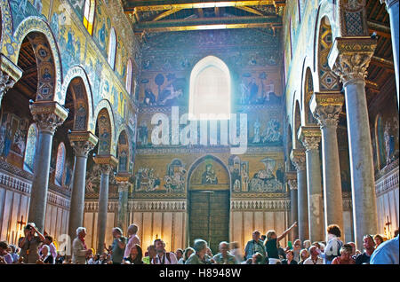 The interior of Monreale Cathedral decorated with the famous mosaics on the golden background, Sicily, Italy Stock Photo