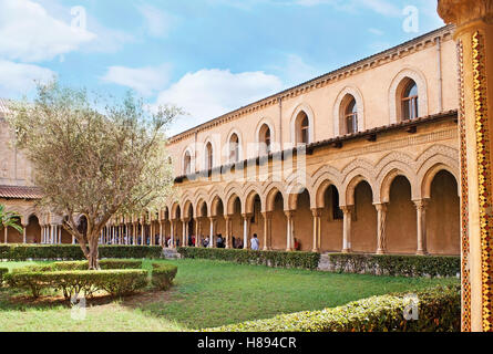 The Monreale Cloister is famous for the old garden, decorated with unique columns of covered gallery, Sicily, Italy Stock Photo