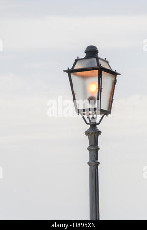 Vintage, old street lamp in classic style, made of cast iron and or metal Stock Photo