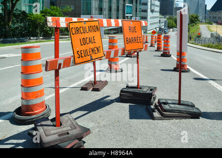 Montreal roadworks orange signs and cones Stock Photo