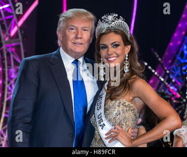 LAS VEGAS, NV - June 16:  Donald Trump and Miss USA 2013 Erin Brady at Miss USA 2013 press conference with new Miss USA 2013 Erin Brady of Connecticut at Planet Hollywood Resort on June 16, 2013 in Las Vegas, NV. © Kabik/ Starlitepics /MediaPunch Inc. Stock Photo