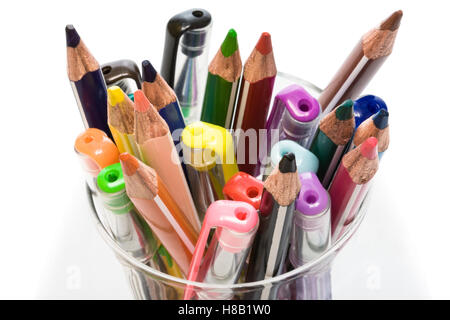 pens and pencils in a glass on a white background Stock Photo