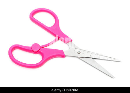 scissors with pink handles on a white background Stock Photo